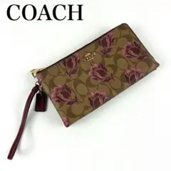 COACH リボンプリント CZ326 ラウンドファスナー長財布 - メルカリ