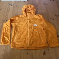 THE NORTH FACE ナイロンジャケット オレンジ140のサムネイル