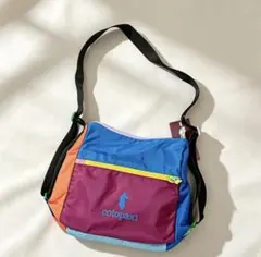 Cotopaxi ショルダーバッグ マルチカラー - メルカリ