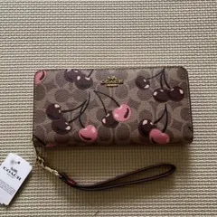 コーチ 長財布 シグネチャーキャンバス チェリープリント ベージュ アウトレット