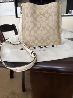 COACH （コーチ）クリーム色 ミニショルダーバッグ 持ち手ヒョウ柄 