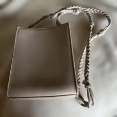 ベージュ編み込みショルダーバッグ