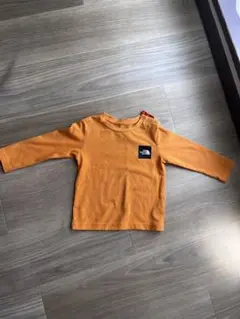 THE NORTH FACE オレンジ 長袖Tシャツ