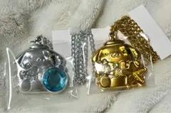 サンリオ いちご新聞50周年記念 きらきら輝くペンダント　ポムポムプリン　金　銀