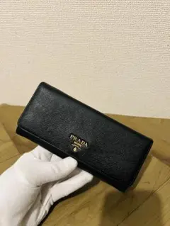 PRADA フラップ 長財布 サフィアーノ メタルロゴ バイカラー 黒 赤