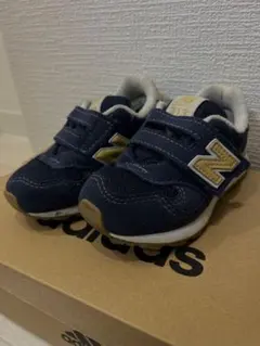 New Balance ベビーシューズ 574 ネイビー