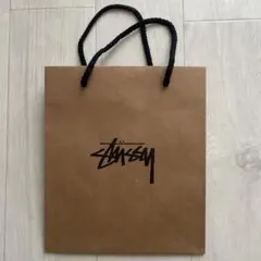 STUSSY ショップ袋 紙袋 ブラウン ブラックロゴ ショッパー - メルカリ