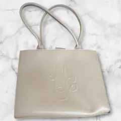 【美品】NICE CLAUP ロゴモチーフエンボストートバッグベージュ