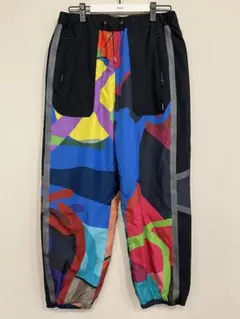 sacai KAWS 21-02568M　トラックパンツ　マルチカラーのサムネイル