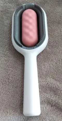 ペットブラシ　犬猫　静電気除去　マッサージ　水タンク付き　ピンク