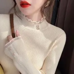 オフホワイト ハイネック ニット フリル リブタートル 細見え 長袖 フリル