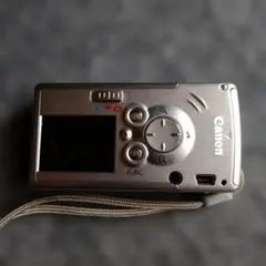 Canon IXY 600F デジカメ パープル 液晶左側日焼け 左下黒線あり