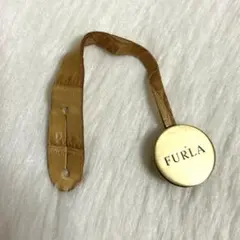 FURLA フルラ ロゴ バッグタグ バッグチャーム ゴールド キャメルのサムネイル
