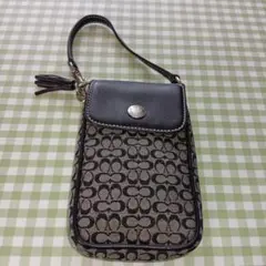 Coach リストレット付きロゴ入りポーチ 　フォンホルダーシグネチャーブラック