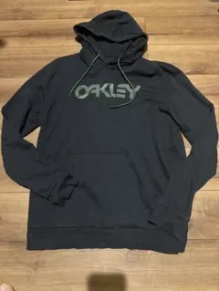 OAKLEY パーカー　2XL 迷彩文字デザインのサムネイル