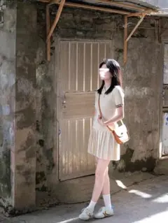 クリーム色 ポロシャツ プリーツスカート セット