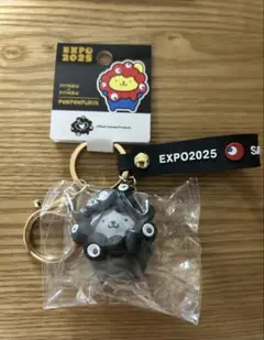 大阪関西万博 ミャクミャク サンリオ キーホルダー 黒なりきり ポムポムプリン