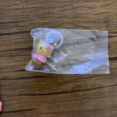 ハローキティ めじるしアクセサリー カプセルトイ　日焼けキティ