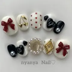 お色変更＆サイズ変更無料♪ ベリーショート　赤いリボンのハートドットネイル♡