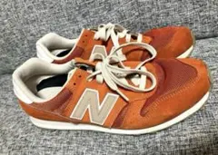 New Balance オレンジ スニーカー