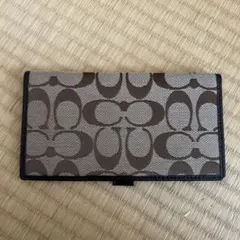 COACH シグネチャー 二つ折りお札入れ
