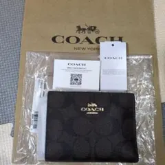 新品未使用、COACH 二つ折り財布 シグネチャー ブラウン正規品！！のサムネイル