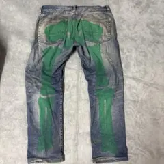 緑色の骨デザインデニムパンツ