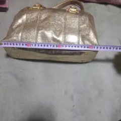 トリーバーチ、メタリックゴールド バッグ