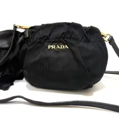 プラダ　ミニ　ショルダーバッグ　巾着　サイドリボン　ナイロン　ロゴジャガード　黒