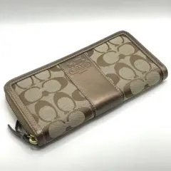 COACH ハンプトンズ シグネチャー ラウンドジップ 長財布