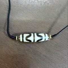 双虎牙天珠 天然天珠 強力守護・魔除け・金運招福 双虎牙天珠 天然瑪瑙 強力守護・魔除け・金運招福 - メルカリ