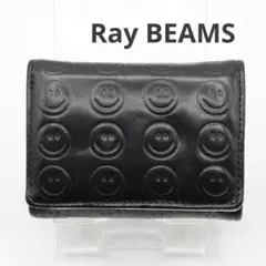 〈Ray BEAMS〉スマイル三つ折り財布 カラーブラック エンボス 黒