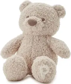 ベージュのクマ型ぬいぐるみ