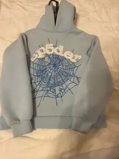 スパイダーグラフィック パーカー ライトブルー正規品！ - メルカリ