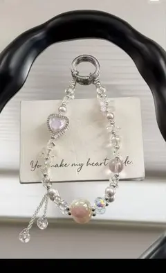 宝石のようなクリアビーズチャームピンクオーロラハートハンドストラップ新品即納