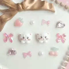 No.902 日焼けハローキティ ピンクイルカ ネイルパーツ5個 - メルカリ
