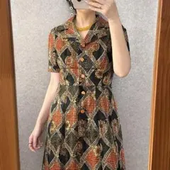 ヴィンテージ 昭和レトロ モダン花柄ワンピース 半袖古着 オレンジ系渋めカラー