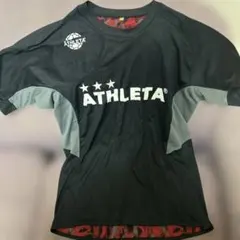 は*ち様 ATHLETA 半袖サッカーウェア ブラック/レッド　リバーシブル