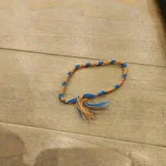 オレンジと青の編み込みブレスレット