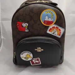 新品 COACH バックパック リュック スヌーピー ブラウン C4115 - メルカリ