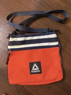 Reebok ショルダーバッグ オレンジ/ネイビーのサムネイル
