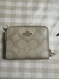 COACH ゴールド 二つ折り財布