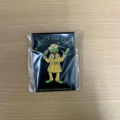 カーミットピンバッジトレンチコート