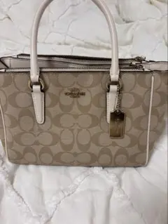 Coach ベージュ ロゴパターン ハンドバッグ
