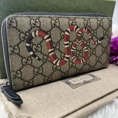 美品✨グッチ　長財布　ラウンドファスナー　蛇　GGスプリーム　PVC レザー　茶
