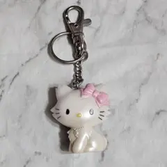 チャーミーキティ ピンク 座布団マカロン リボン紫ストーン付チャーム