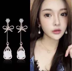 【137】ロングピアス ゴールド ストーン リボン ゆれる 上品 大人かわいい