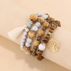 その日の気分で組み合わせ【オシャレな4連】木のモチーフとタッセル付きブレスレット