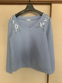 axes femme 水色リボントップス