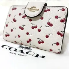 COACH 三つ折り財布 チェリー柄 ホワイト - メルカリ